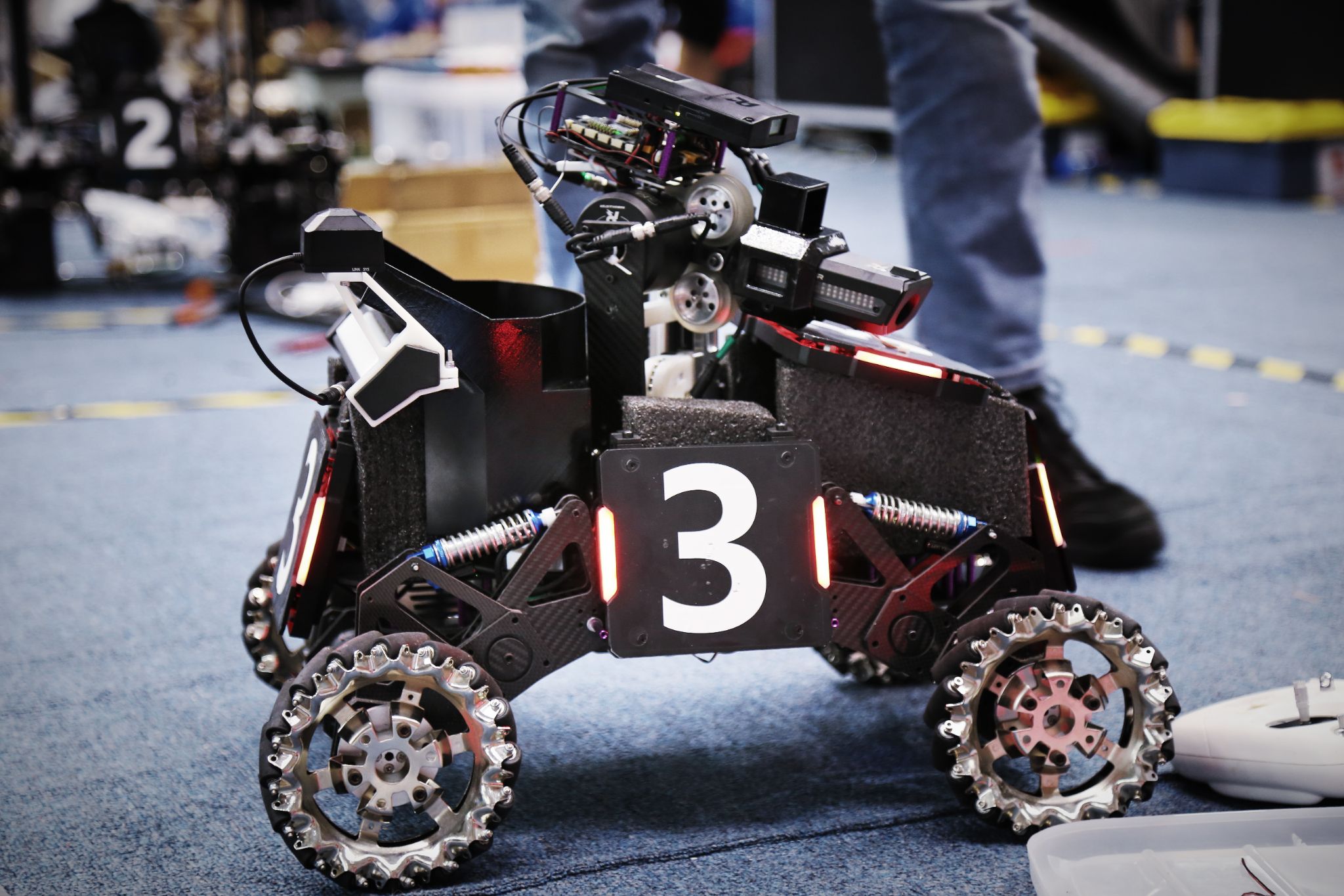 A RoboMaster robot with the number 3